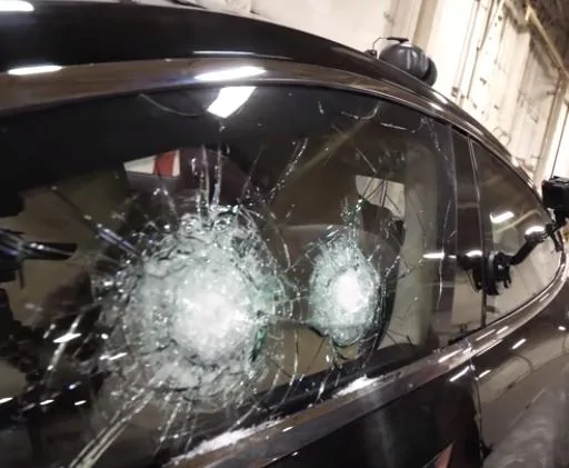 Tesla Cybertruck Broken window bullet proof tesla shot with 9 mm