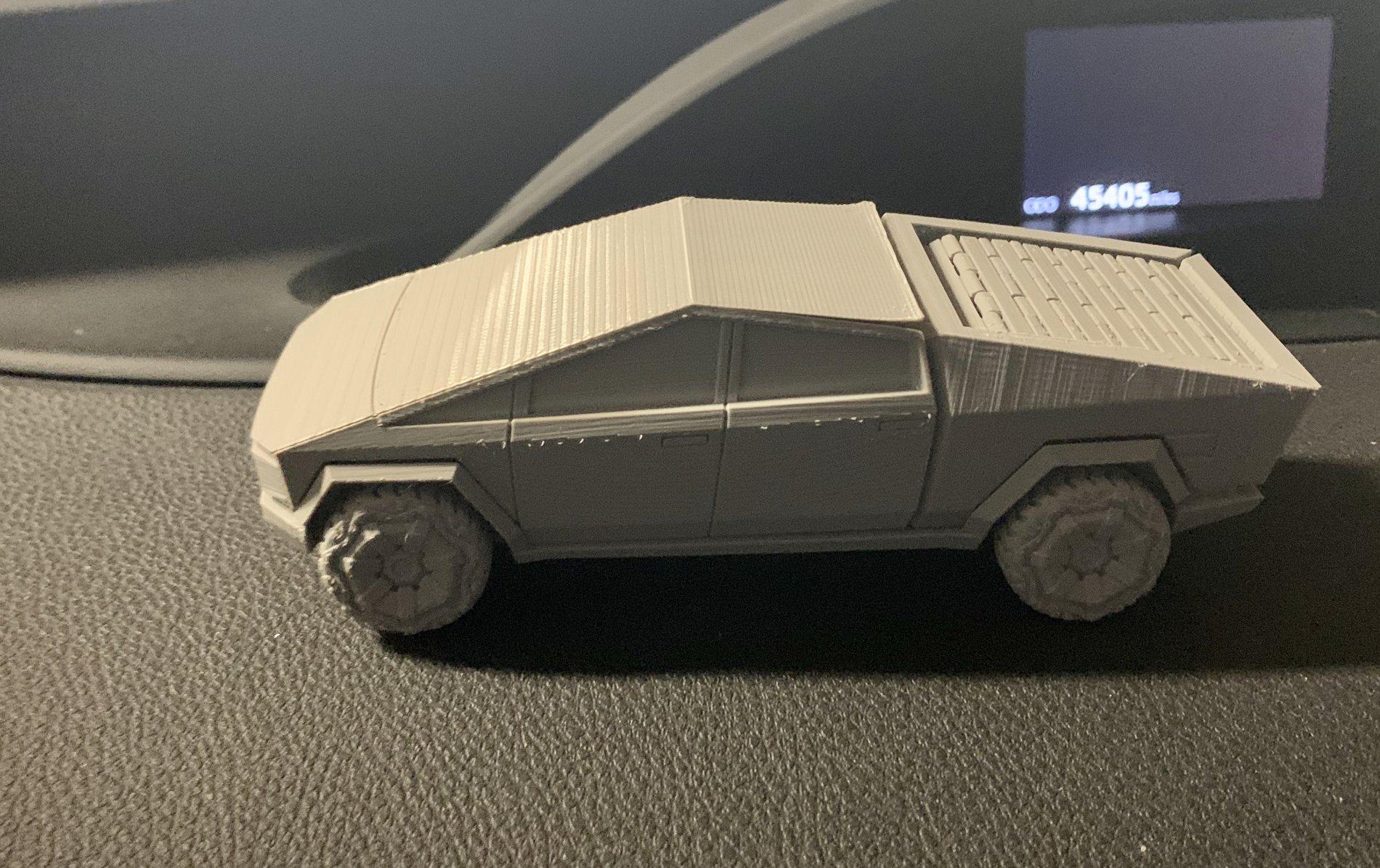 Tesla Cybertruck Cybertruck imagined side-by-side with F-150 Raptor, Ram and classic pickup IMG_0329