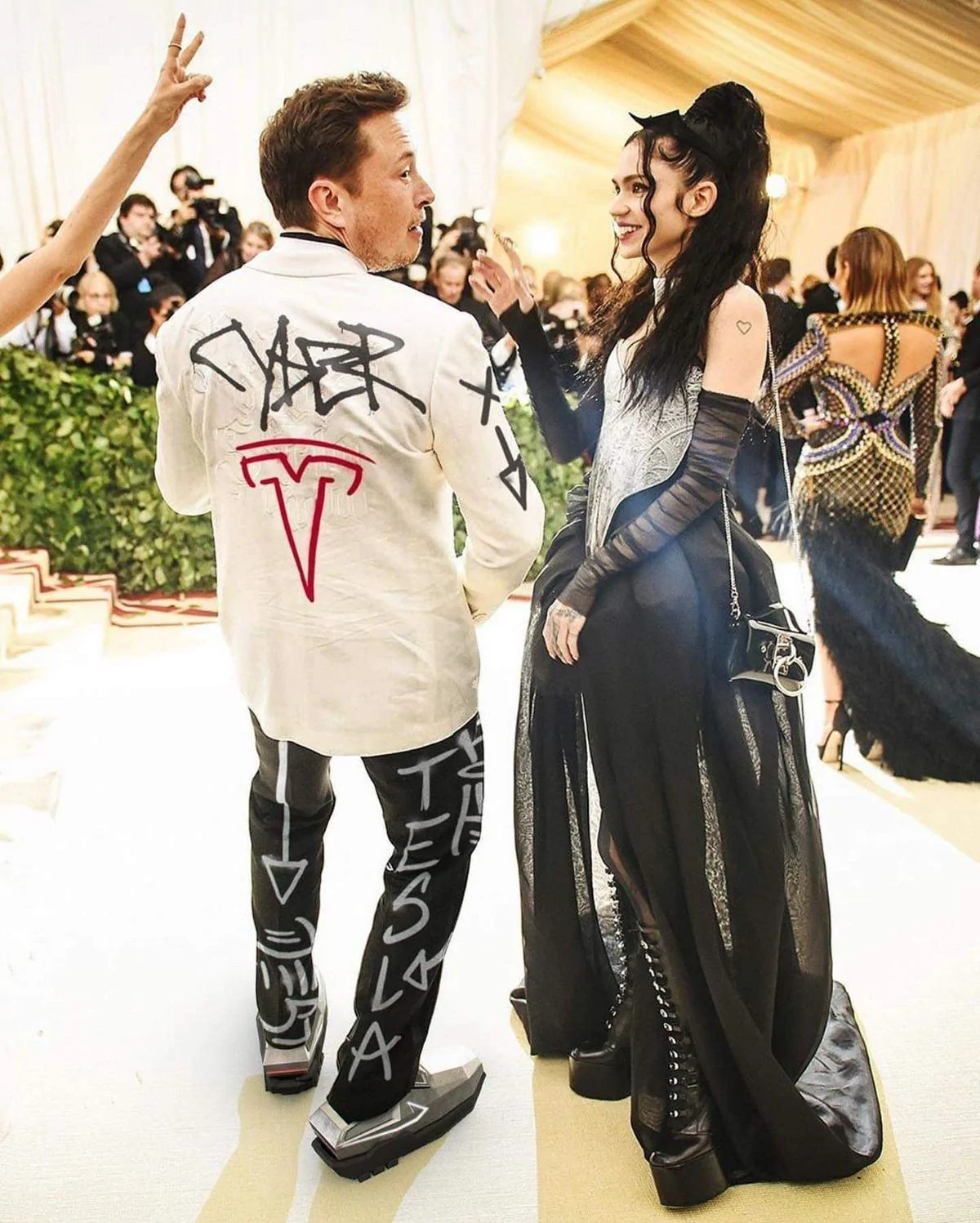 Tesla Cybertruck Check out Elon's Cybershoes and Cyberjacket! C83C41EF-B3DA-4A26-924C-0142C1A8786C