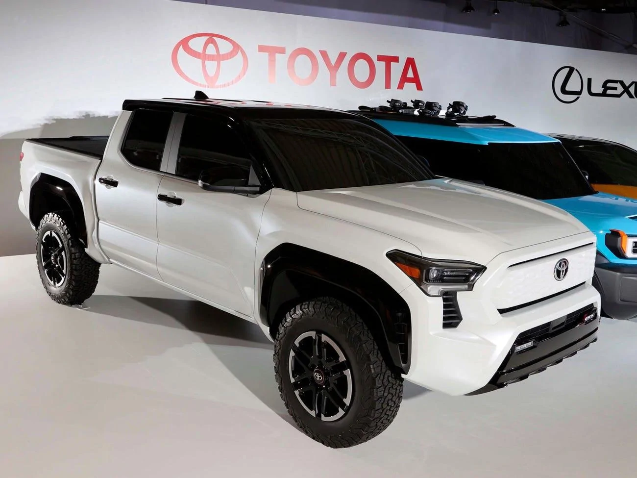 Tesla Cybertruck Toyota revealed an electric truck to compete with the F-150 Lightning and Rivian R1T d8fe45b0018b05262?width=1300&format=jpeg&auto=