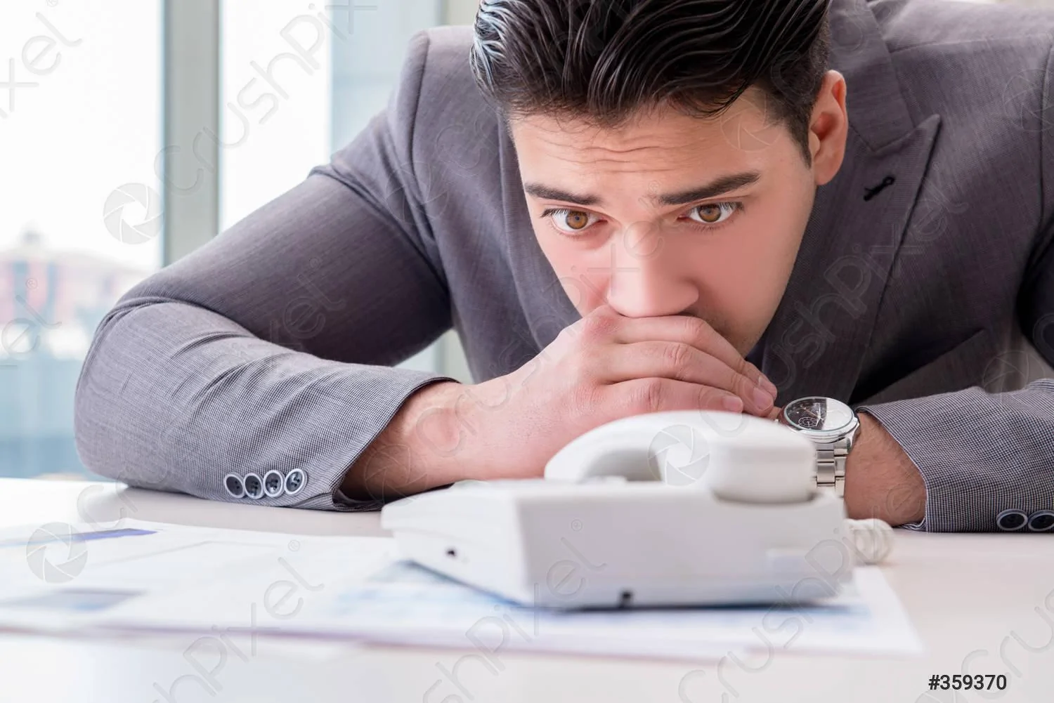 businessman-expecting-important-call-on-359370.jpg