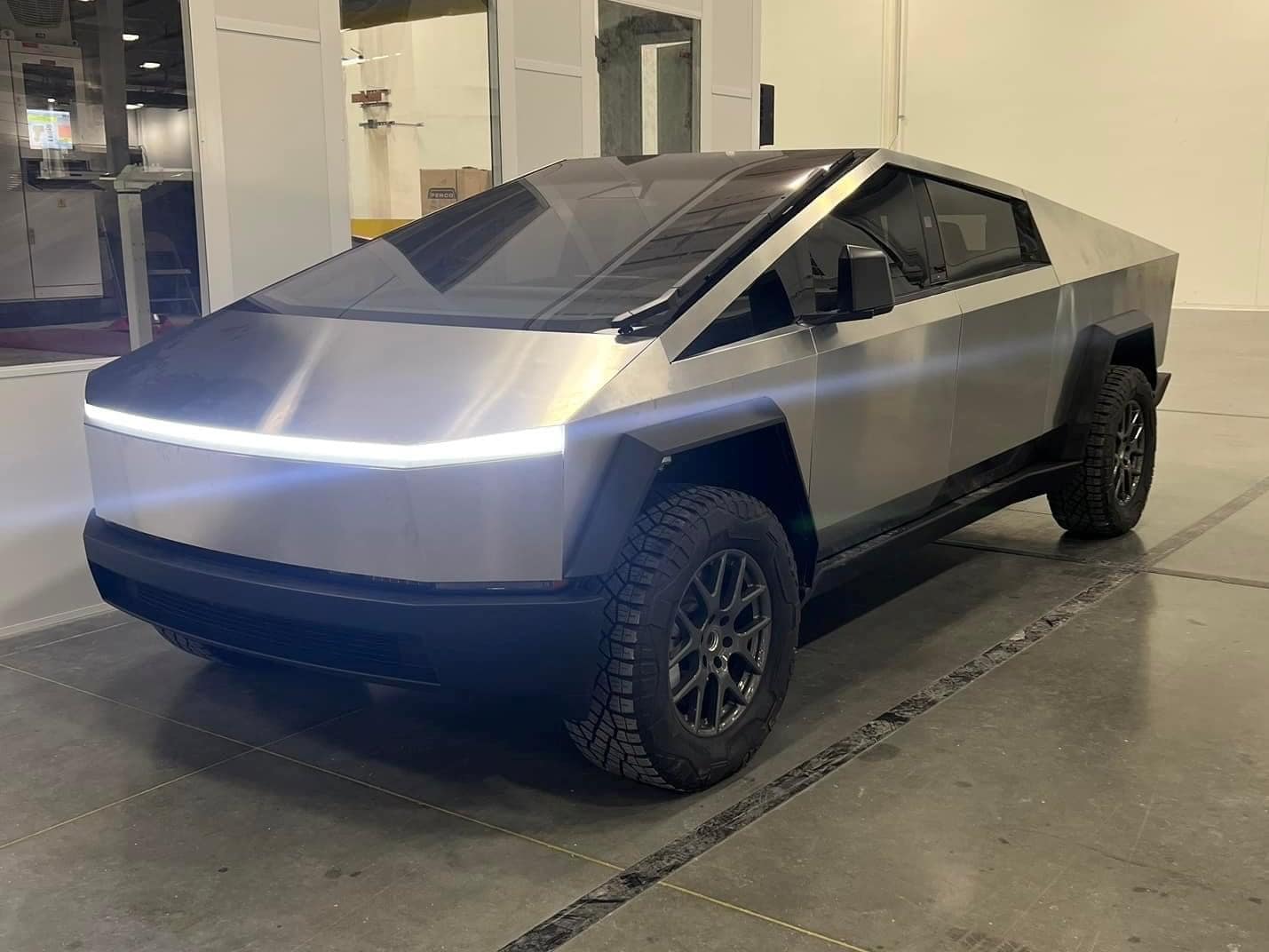 Tesla Cybertruck Cybertruck Photos Leaked! ? [Added: Video Showing Whole Truck -- Rear & Bed] B362D96C-66D1-40E1-8A12-F2DE40B164E5