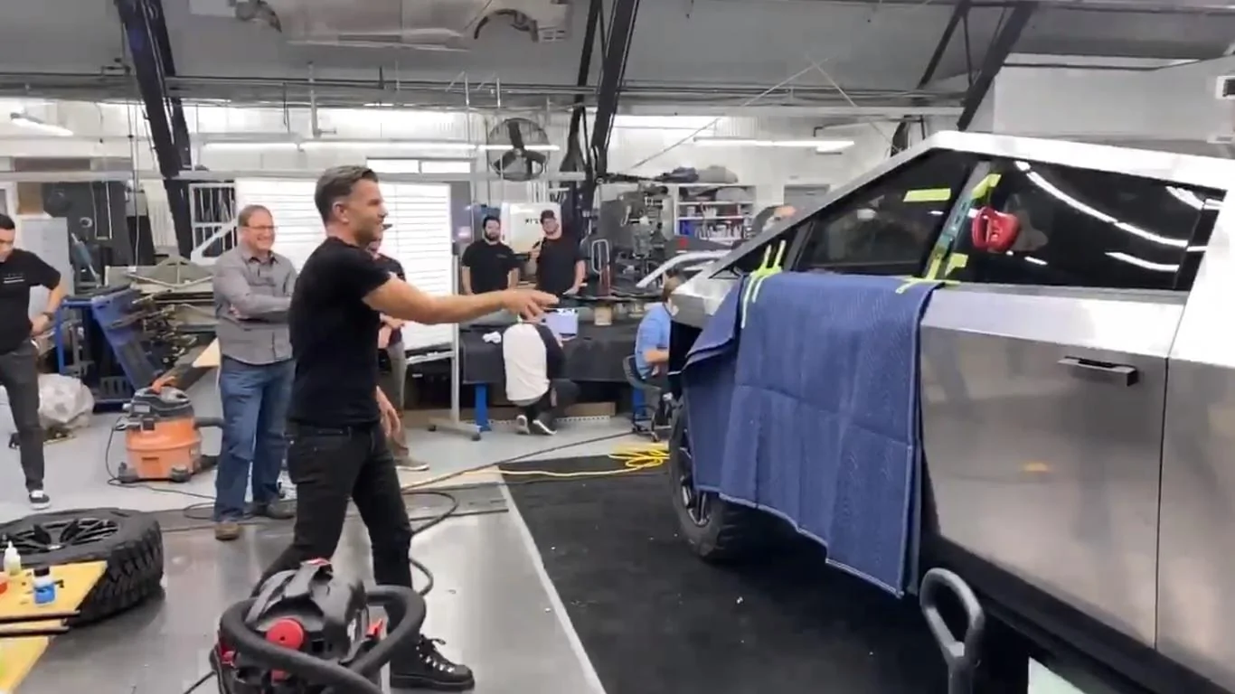 Tesla Cybertruck Cybertruck Photos Leaked! ? [Added: Video Showing Whole Truck -- Rear & Bed] tesla-design-head-throws-steel-ball-at-cybertruck-window-doesn-t-shatter-139220_1