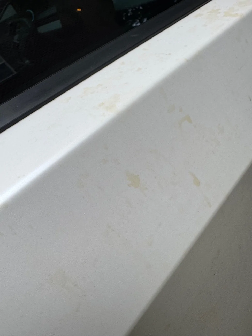 Tesla Cybertruck Cybertruck wrap stains…satin crystal white IMG_1914