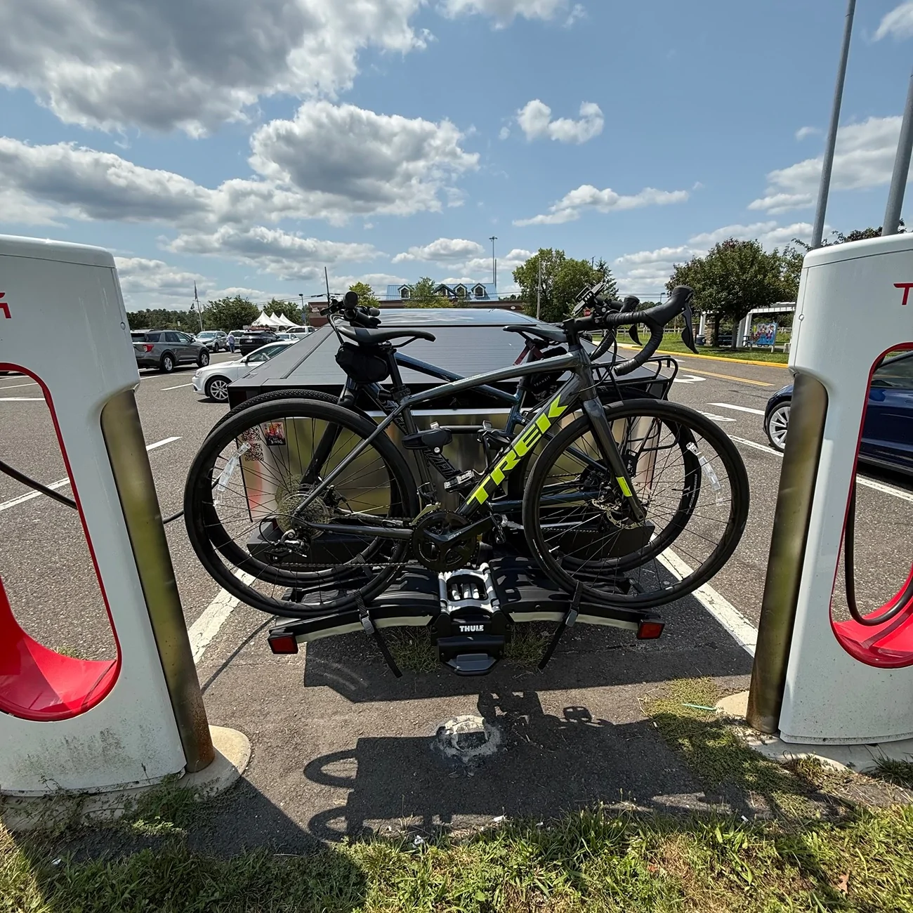 Tesla Cybertruck Bike rack installed and need a supercharger? No problem w/ Thule EasyFold XT 2-bike hitch rack IMG_0590