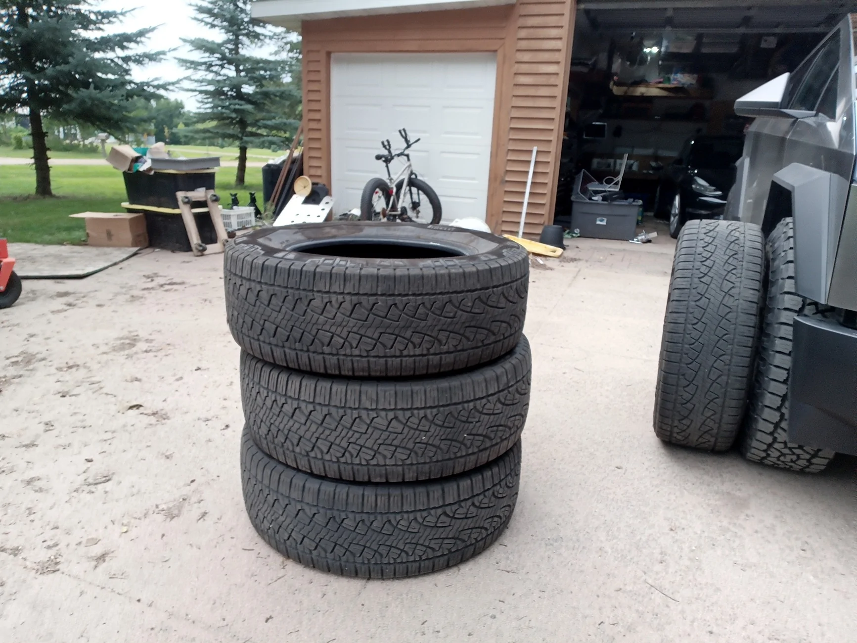 Tesla Cybertruck How to fit 36" tires (35.7) on stock wheels without rubbing. TireStack[1]
