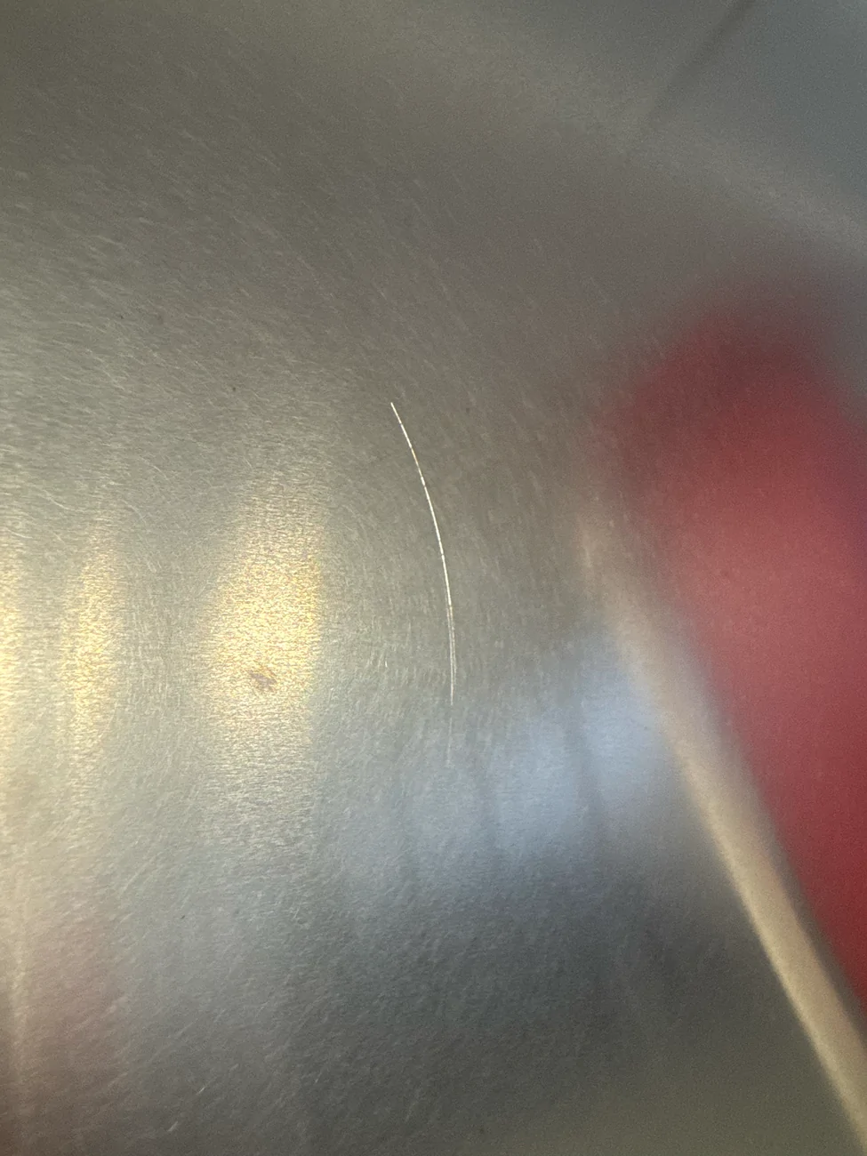 Tesla Cybertruck Gouge in stainless steel panel at delivery - would you accept? tempImageSTKNdB