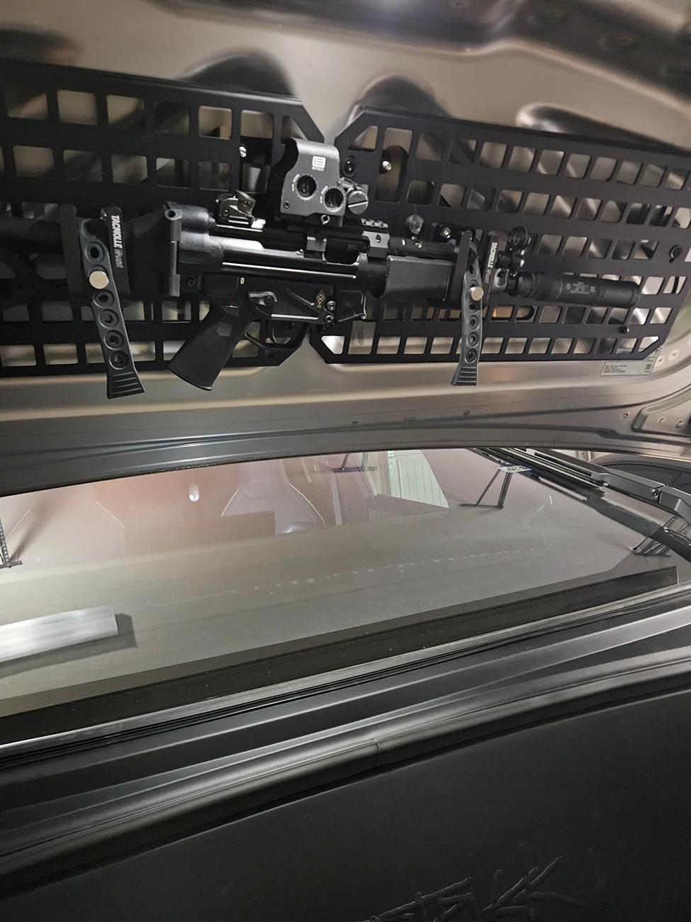 Tesla Cybertruck Molle panel in frunk. My favorite upgrade!!! 1000004749