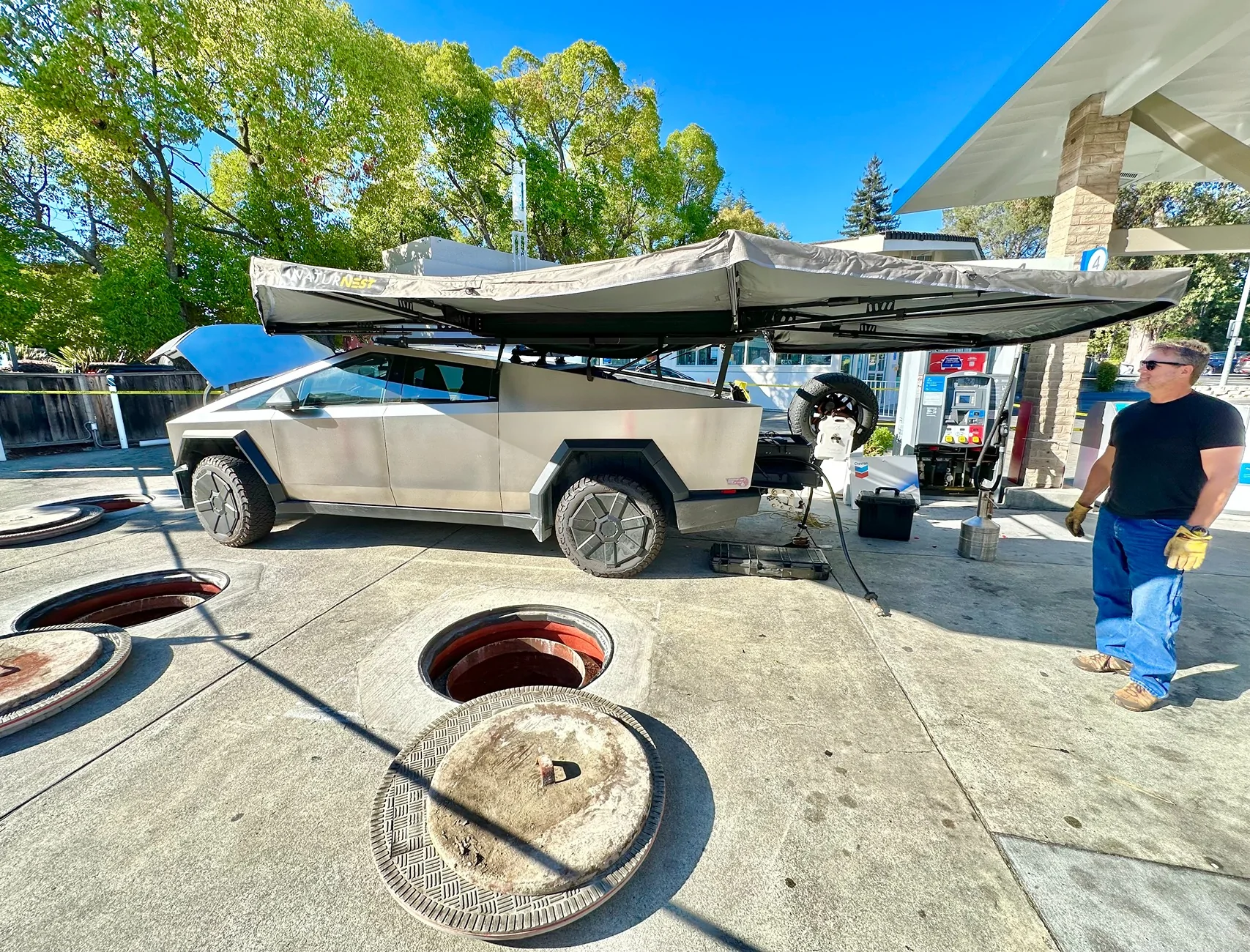 Tesla Cybertruck Cybertruck owners uses it to perform gas station leak checks, saving him $30K in fuel costs per year Gy0VjISbEAE3EWI
