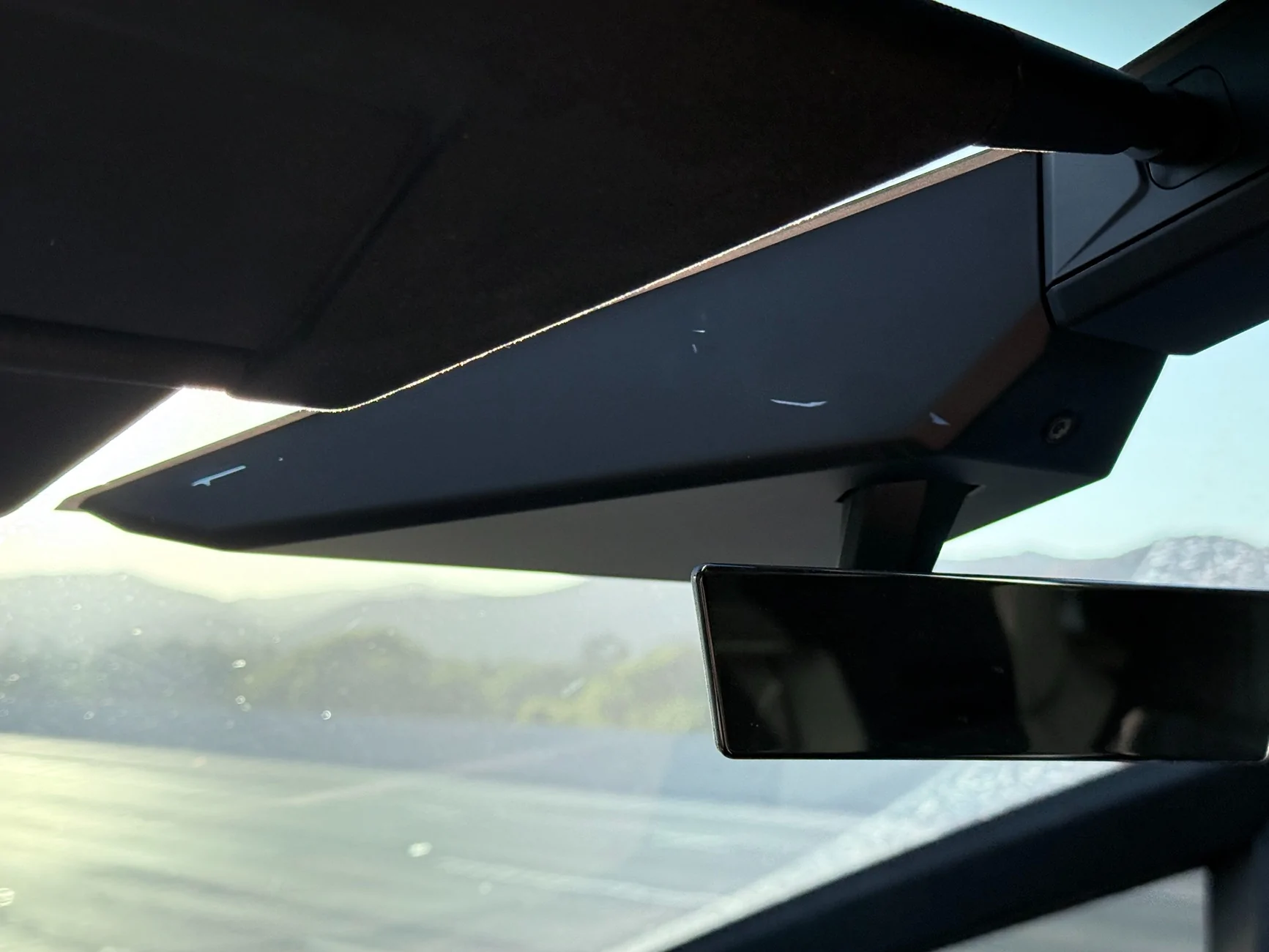 Tesla Cybertruck Weird see-through plastic "Scratches" behind camera IMG_7918