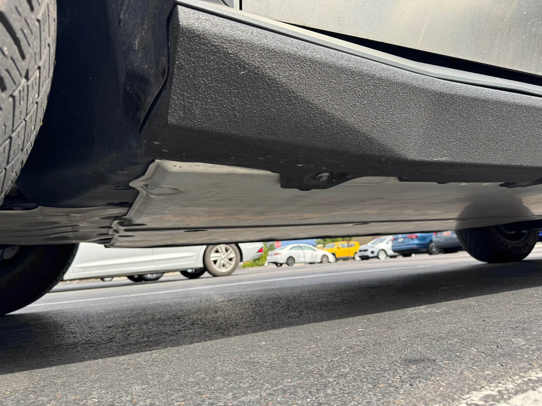 Tesla Cybertruck Terrestrial Armor installed (Underbody Shield & Rock Sliders / Structural Rockers) IMG_2143