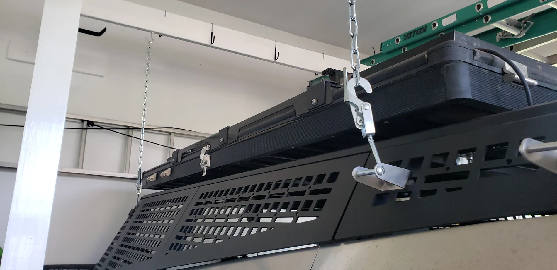 Tesla Cybertruck Removing my Urander bedrack using custom overhead frame in garage ceiling Bedrack Removal 1