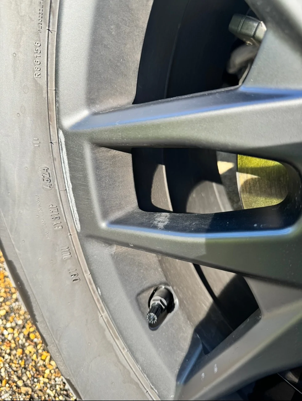 Tesla Cybertruck Core wheel covers damaged wheels IMG_7316