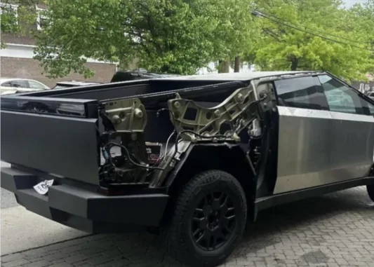 Tesla Cybertruck let's emphasize how strong and tough this stainless steel body is IMG_2094