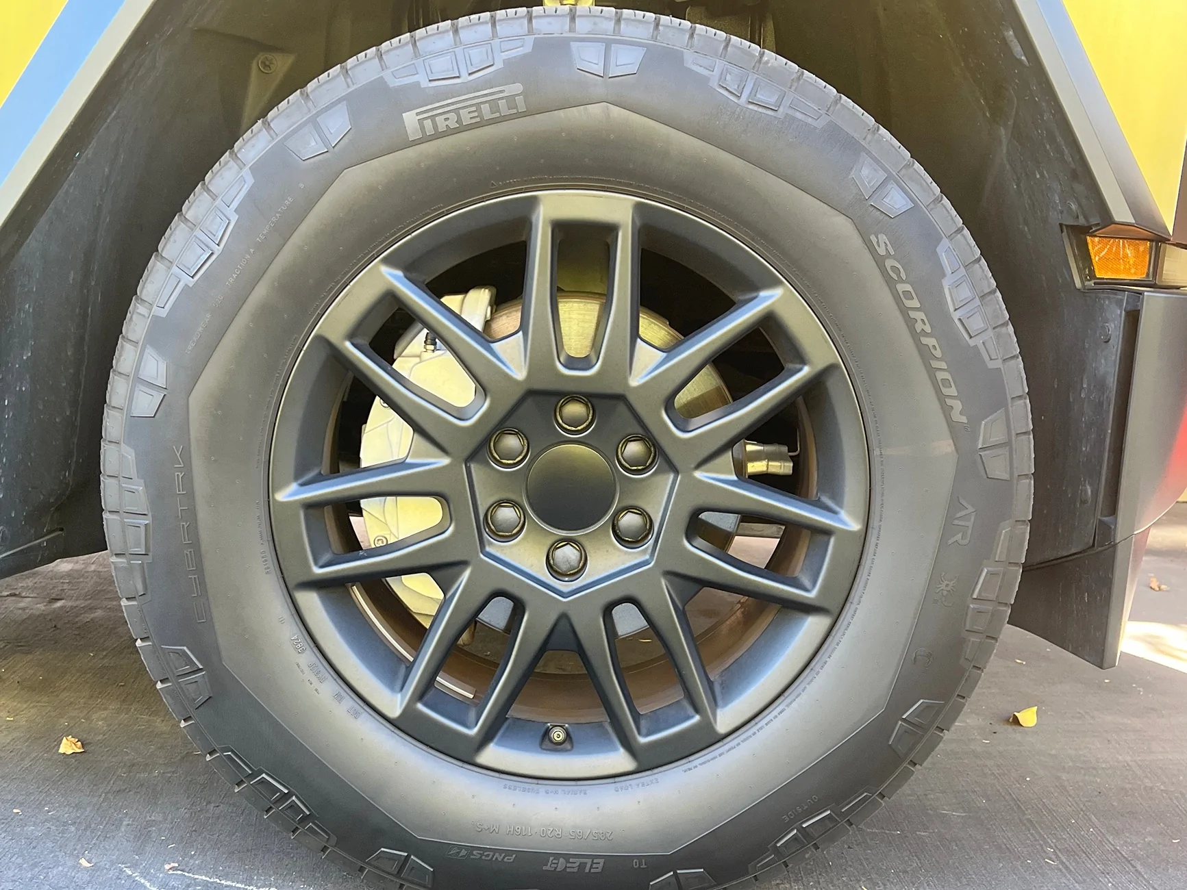 Tesla Cybertruck Any Recommendations of Center Hubcaps for Core Wheels with AS Tires? IMG_9856