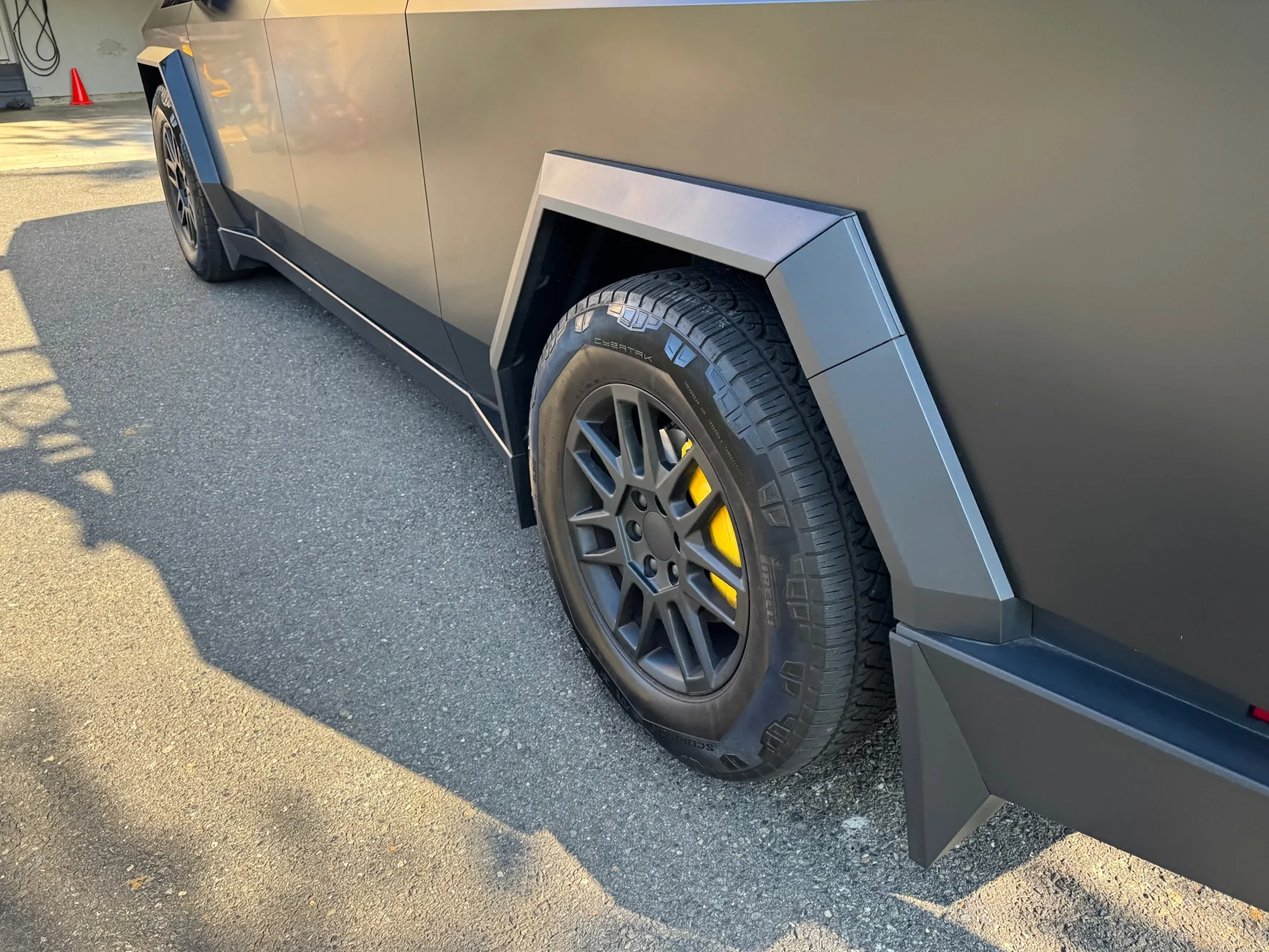 Tesla Cybertruck Are these the same brake caliper covers? IMG_0469