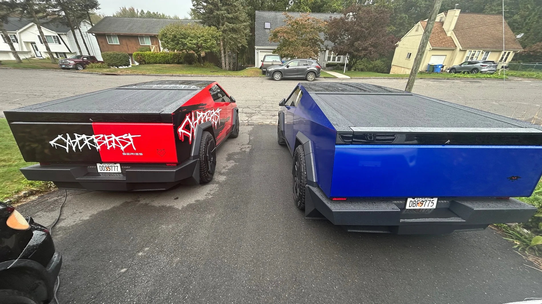 Tesla Cybertruck Water puddling on the rear bumper and license plate. IMG_0492