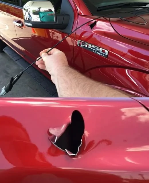 Tesla Cybertruck Water puddling on the rear bumper and license plate. 1758907577855-ns