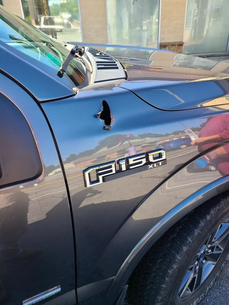 Tesla Cybertruck Water puddling on the rear bumper and license plate. 1758908162548-8s