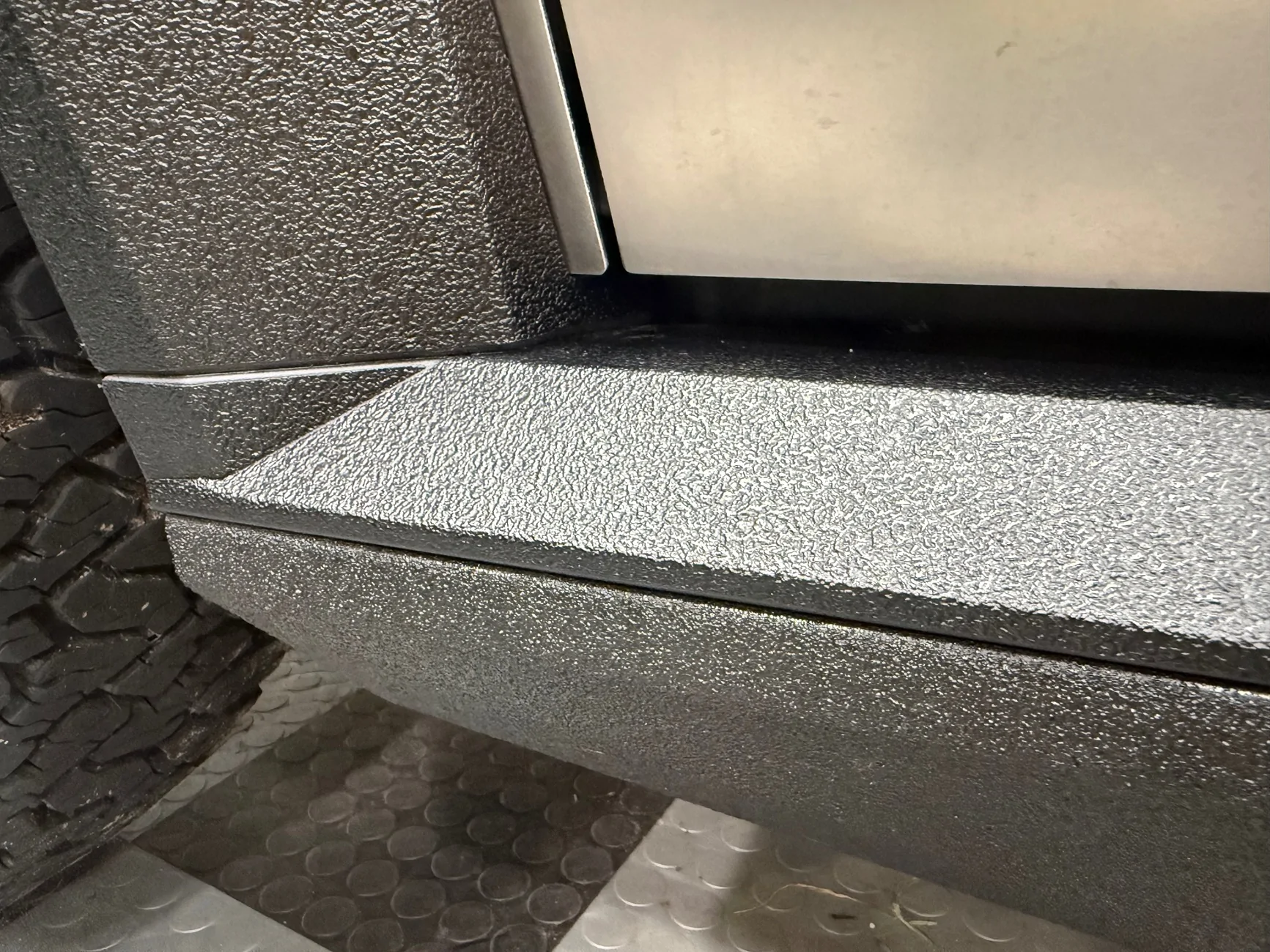 Tesla Cybertruck OEM Tesla Rock Sliders + Body Armor Skidplate (Cybertruck Terrestrial Armor Package) Released IMG_5273