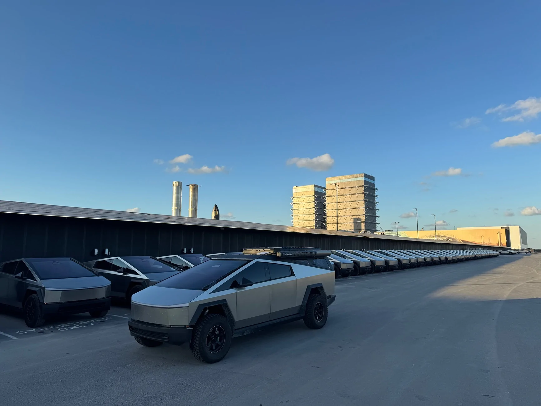 Tesla Cybertruck Starbase aka CyberTruck City now... Fleet of Cybetrucks to replace all gas work trucks IMG_4344