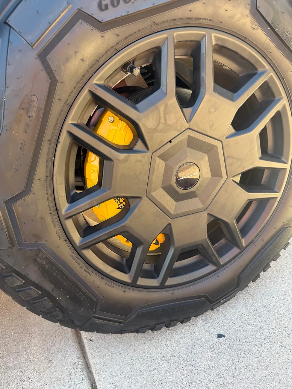 Tesla Cybertruck Are these the same brake caliper covers? IMG_6753