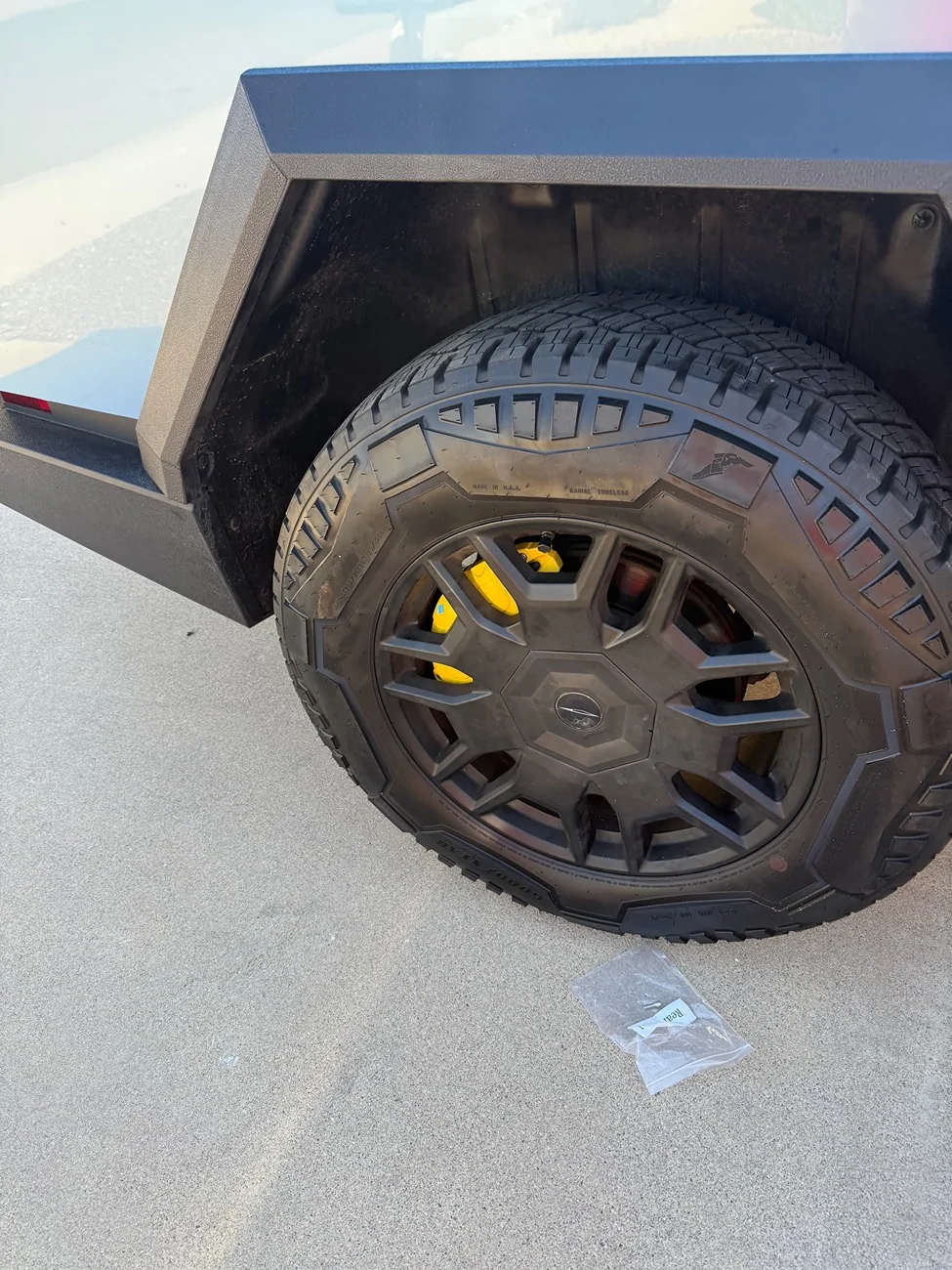 Tesla Cybertruck Are these the same brake caliper covers? IMG_6754