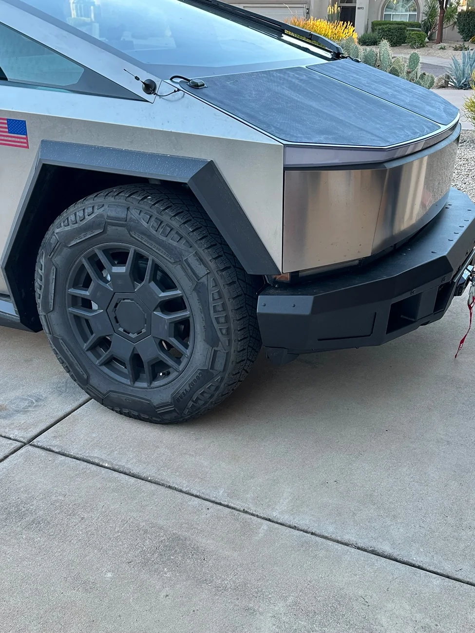 Tesla Cybertruck CybertruckCo Solar Frunk, Urander Rack 2.0, Unplugged Performanece Side Molle Sail Panels, and TSportLine CTX Front Bumper IMG_3495