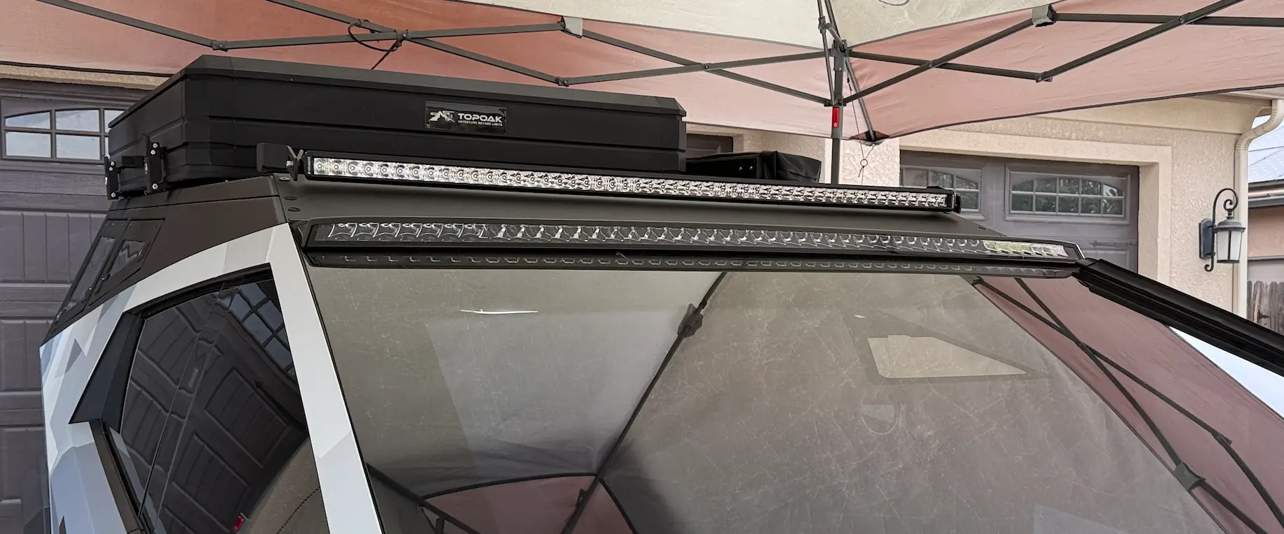 Tesla Cybertruck CybertruckCo Solar Frunk, Urander Rack 2.0, Unplugged Performanece Side Molle Sail Panels, and TSportLine CTX Front Bumper 1761584410488-3j