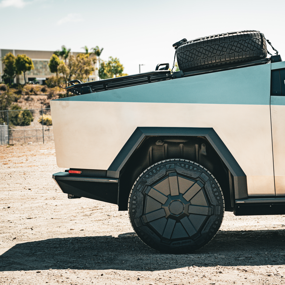 Tesla Cybertruck CybertruckCo Solar Frunk, Urander Rack 2.0, Unplugged Performanece Side Molle Sail Panels, and TSportLine CTX Front Bumper tesla-cybertruck-offroad-rear-bumper-from-cybertruuckco-1