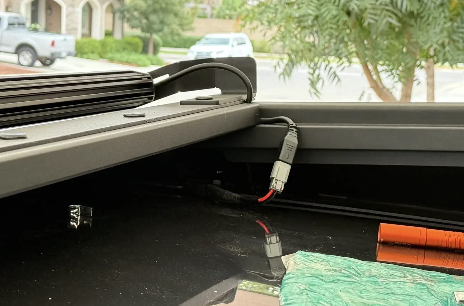 Tesla Cybertruck CybertruckCo Solar Frunk, Urander Rack 2.0, Unplugged Performanece Side Molle Sail Panels, and TSportLine CTX Front Bumper 1761629855930-lm