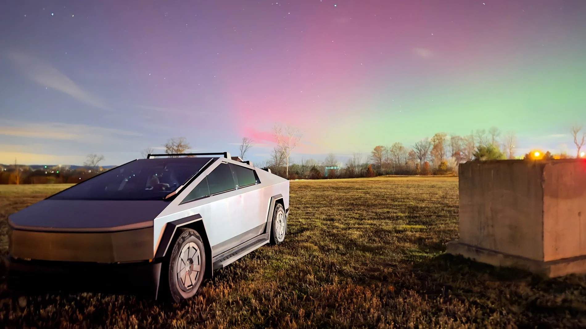 Tesla Cybertruck UFO with the northern lights and starlink IMG_1730