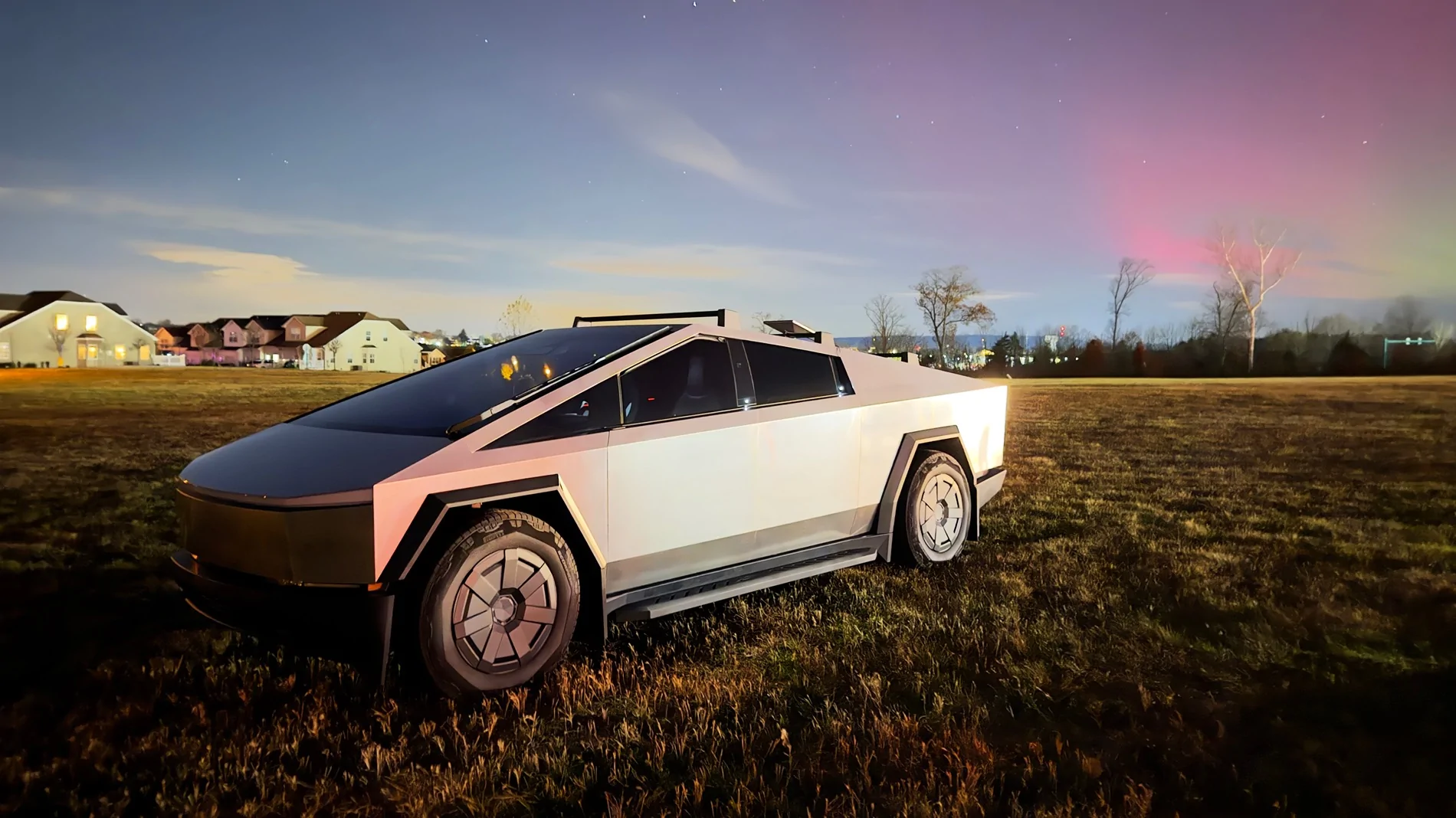 Tesla Cybertruck UFO with the northern lights and starlink IMG_1731