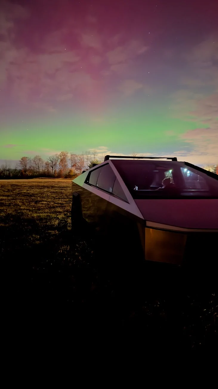 Tesla Cybertruck UFO with the northern lights and starlink IMG_1715