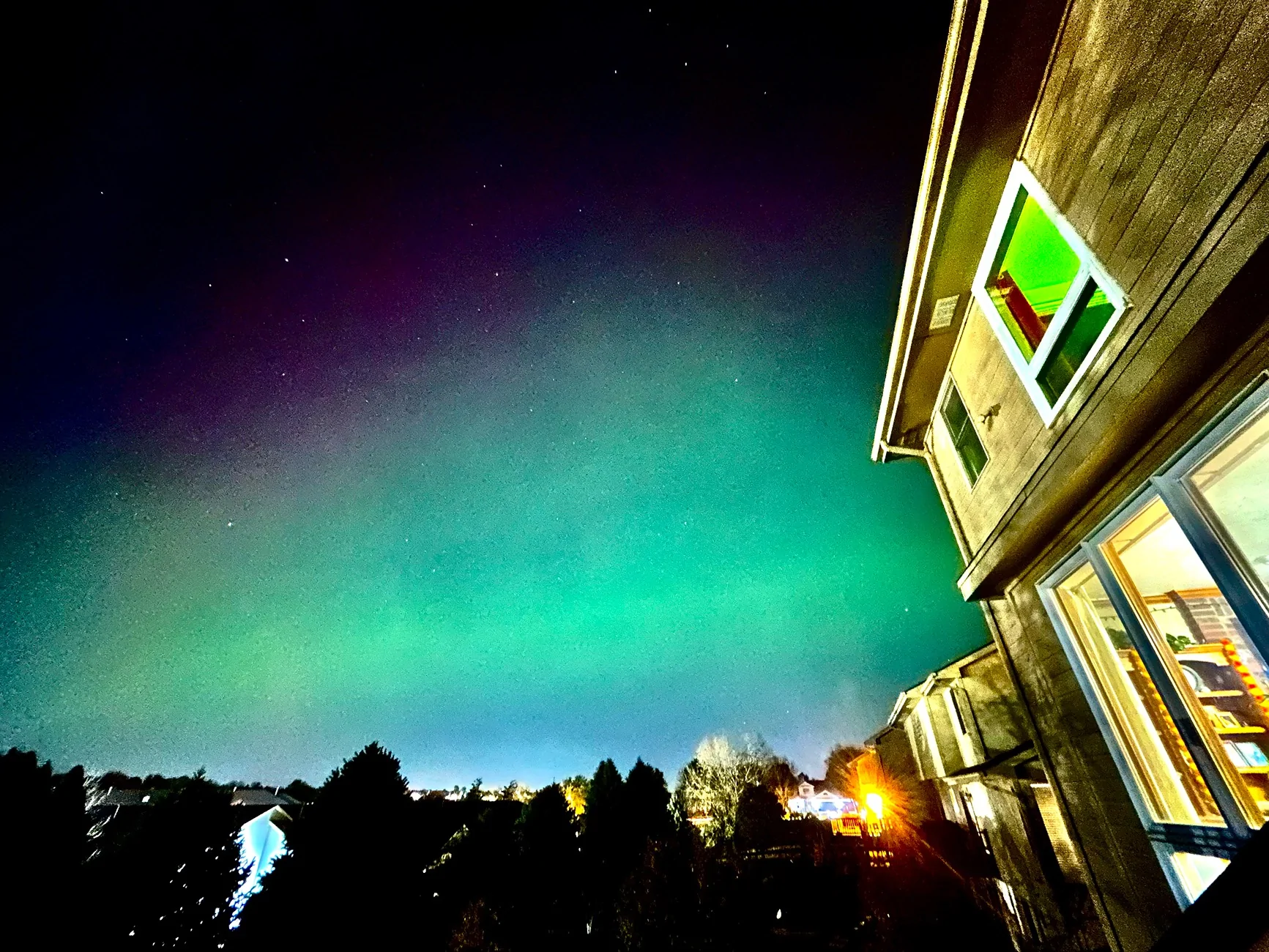Tesla Cybertruck UFO with the northern lights and starlink IMG_1513