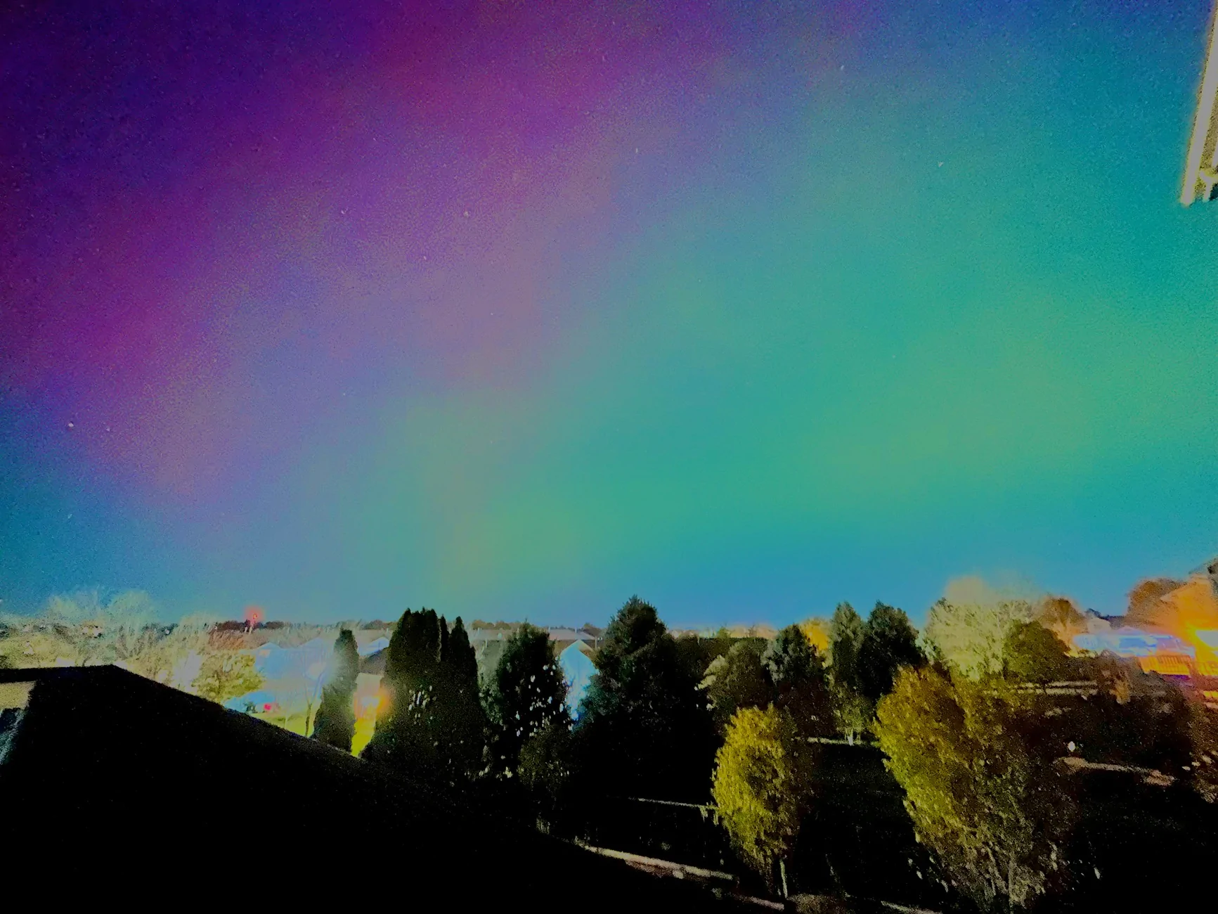 Tesla Cybertruck UFO with the northern lights and starlink IMG_1511