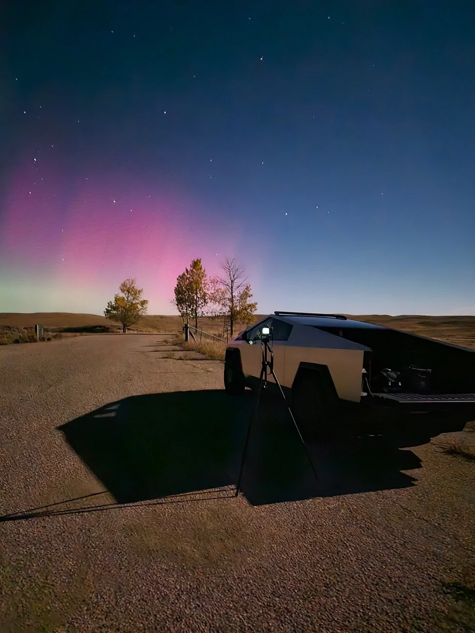 Tesla Cybertruck UFO with the northern lights and starlink 1000010653