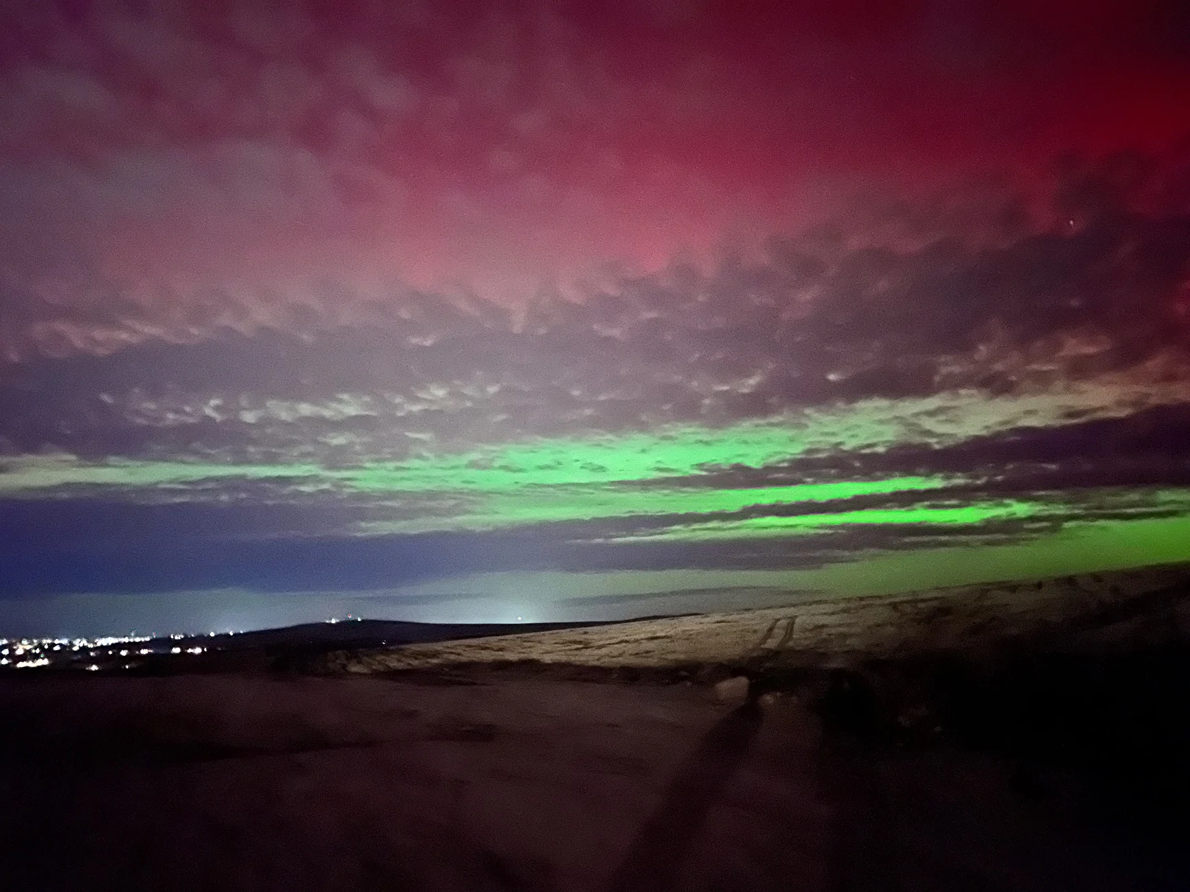 Tesla Cybertruck UFO with the northern lights and starlink IMG_2432