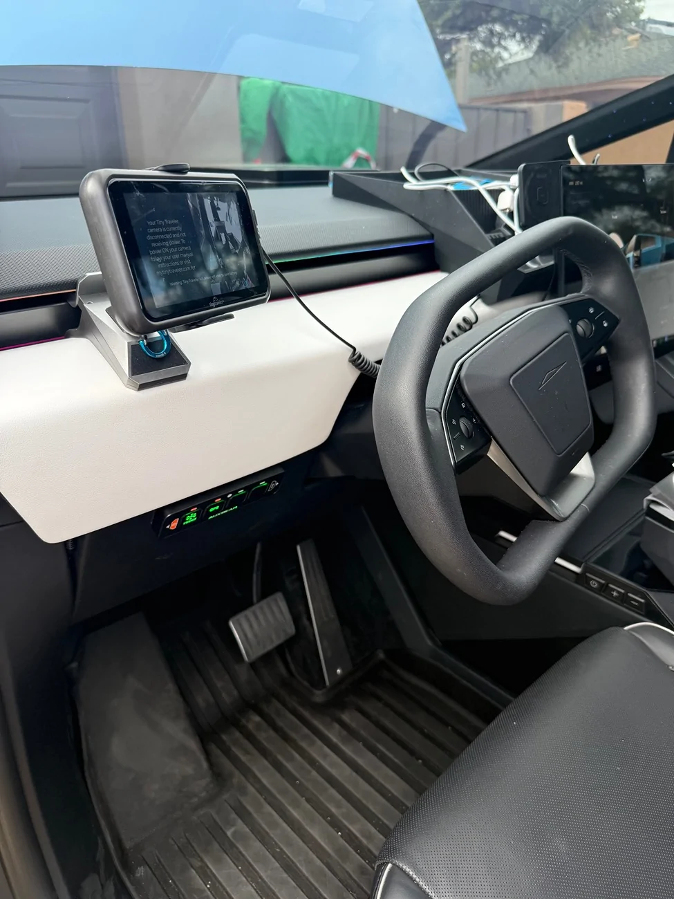 Tesla Cybertruck Split the 48v power line to a 12v socket in frunk. It now powers the console fridge INSIDE cabin 😎 IMG_7334