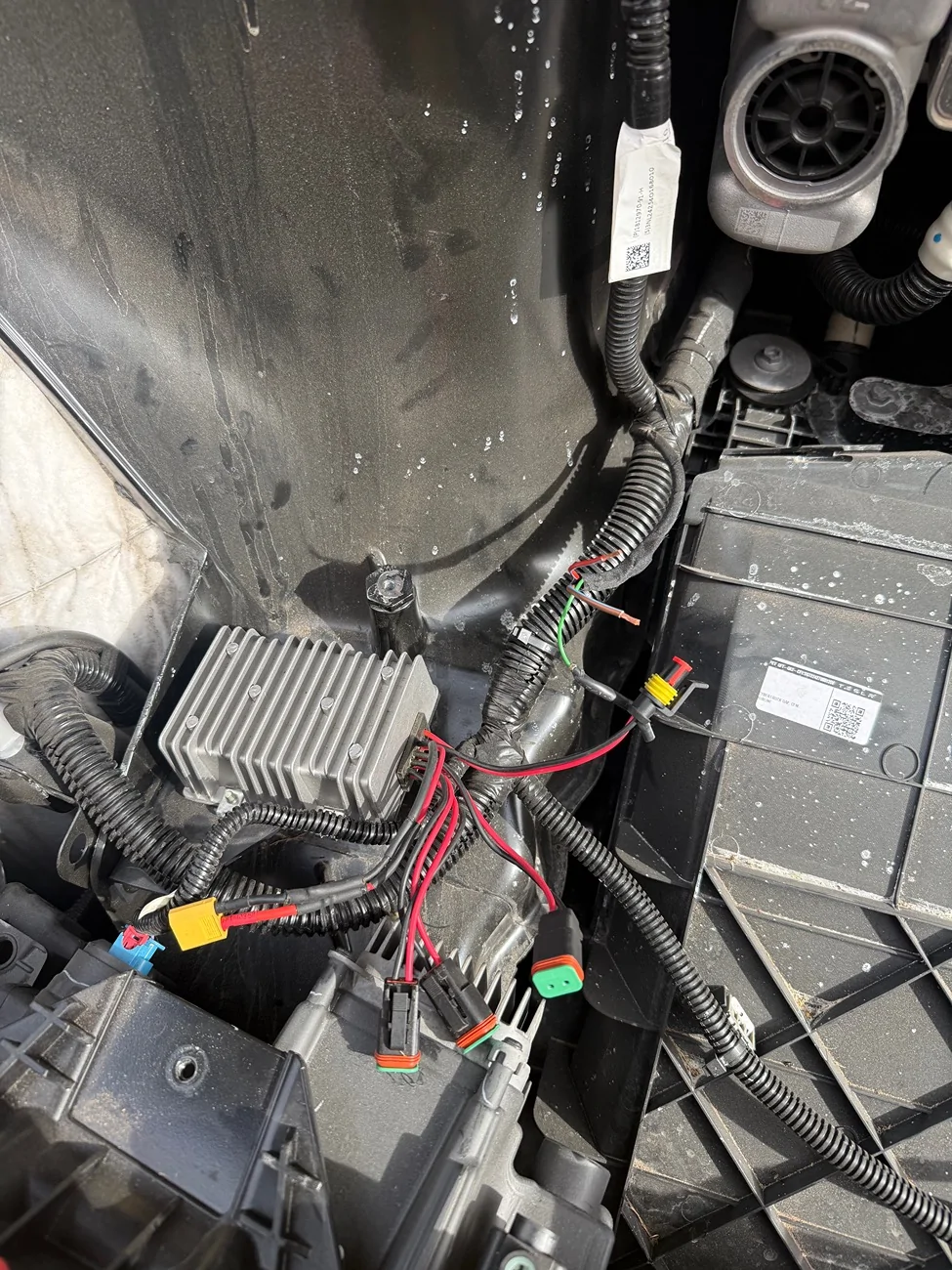 Tesla Cybertruck Split the 48v power line to a 12v socket in frunk. It now powers the console fridge INSIDE cabin 😎 IMG_7327