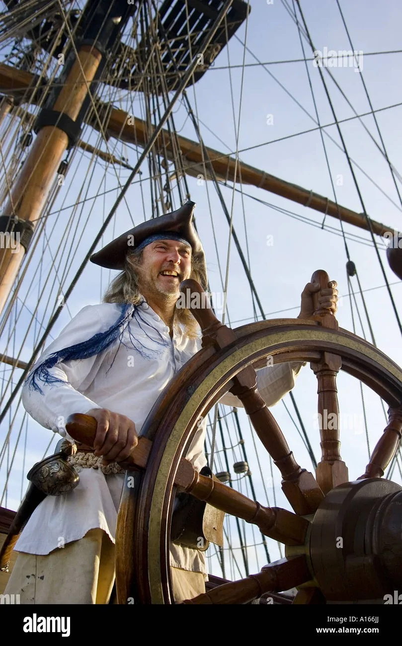 Tesla Cybertruck To Yoke, or Not to Yoke, that is the question. laughing-pirate-at-the-wheel-of-the-18th-century-mano-war-grand-turk-A166JJ