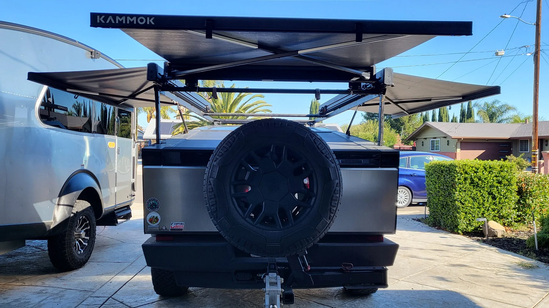 Tesla Cybertruck Kammock awnings installed on three sides of bed vault {filename}