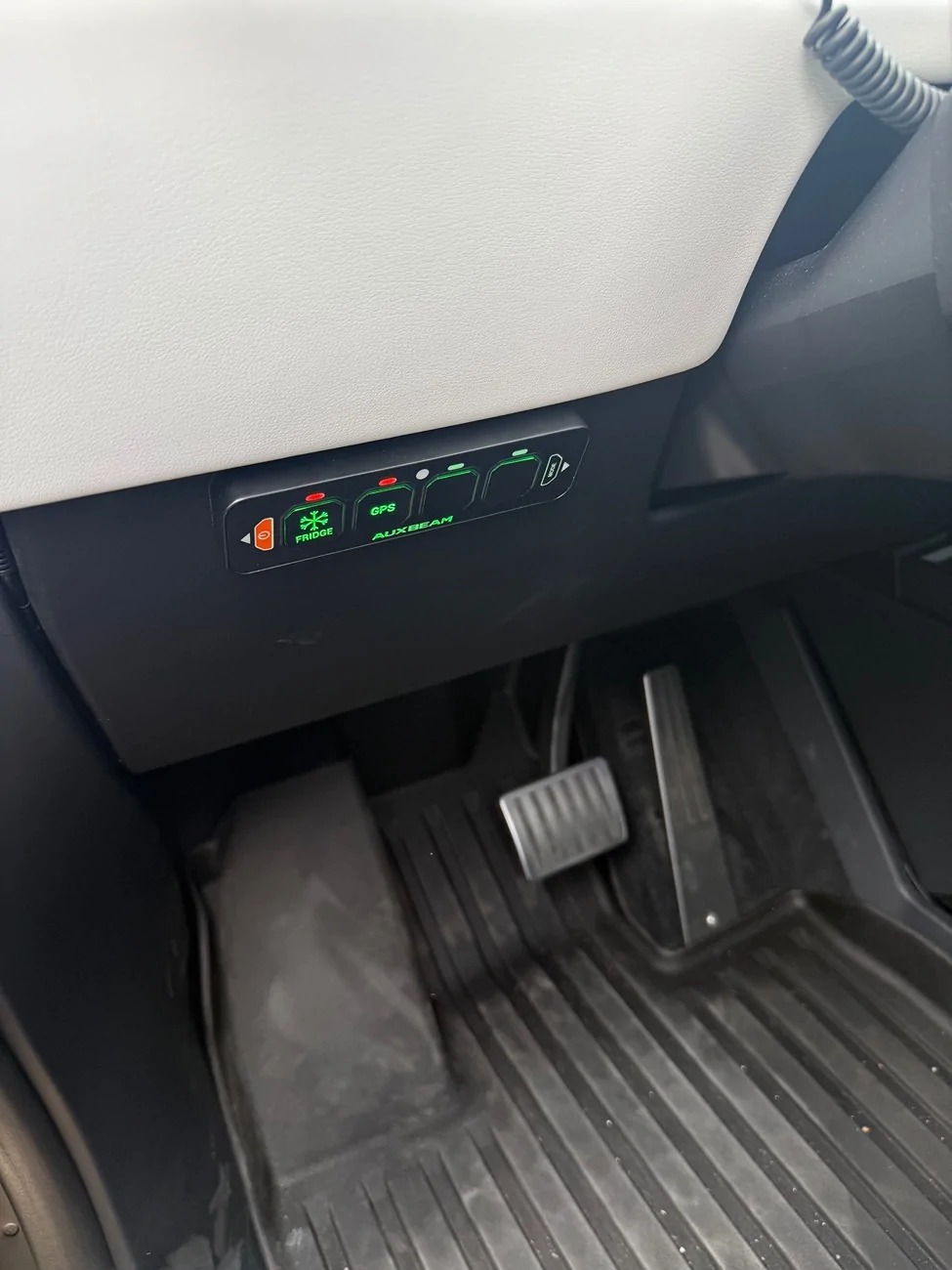 Tesla Cybertruck Split the 48v power line to a 12v socket in frunk. It now powers the console fridge INSIDE cabin 😎 IMG_7336
