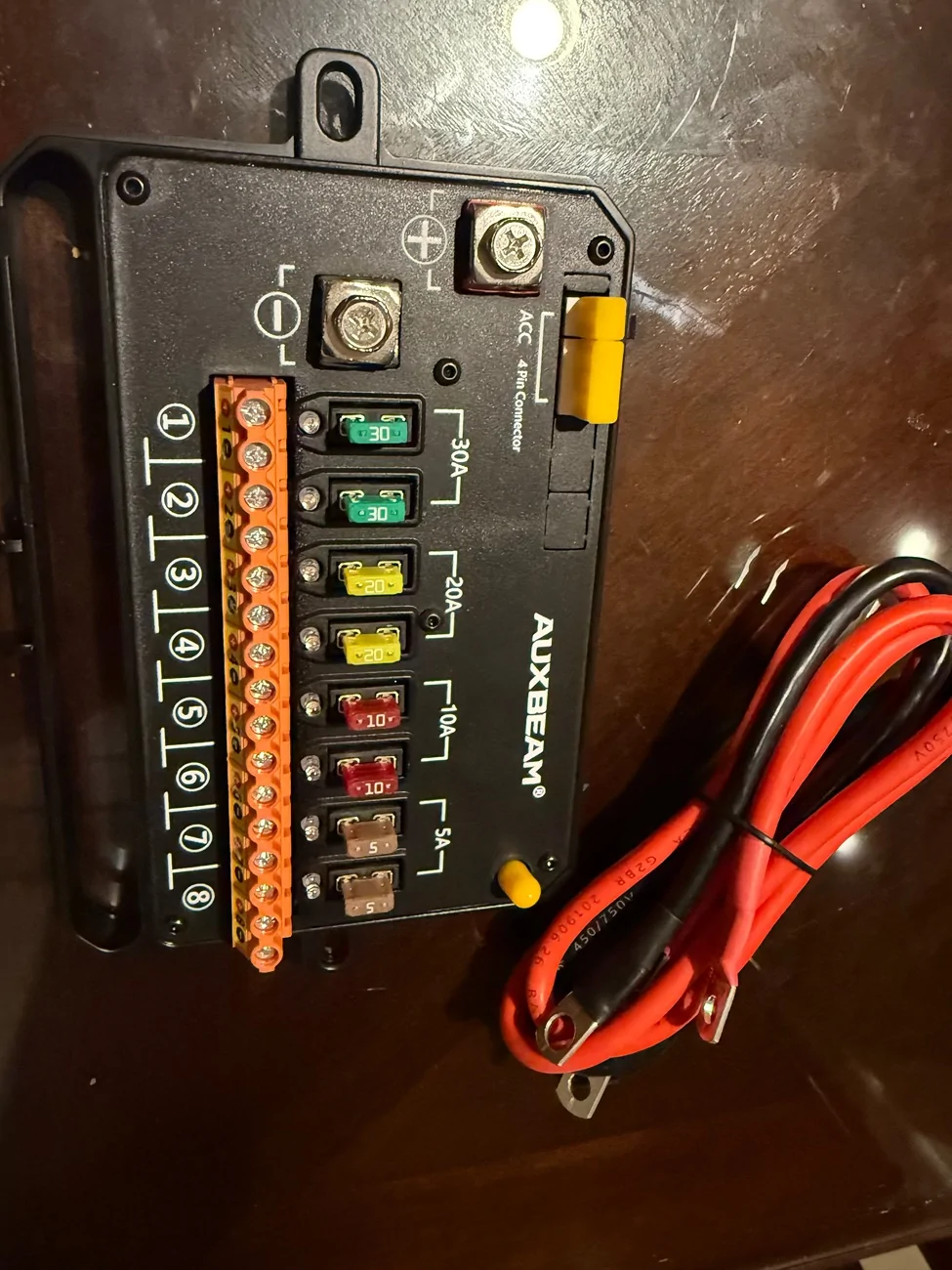 Tesla Cybertruck Split the 48v power line to a 12v socket in frunk. It now powers the console fridge INSIDE cabin 😎 IMG_9191