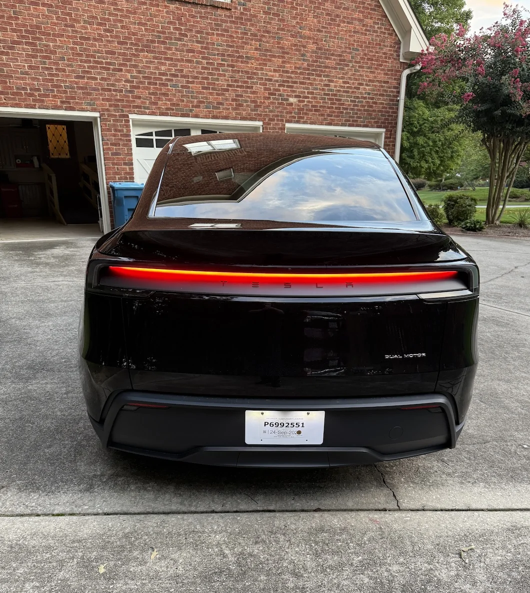 Tesla Cybertruck FSD parking oops (hit house reversing into garage)… yes I know I’m supervising IMG_3734