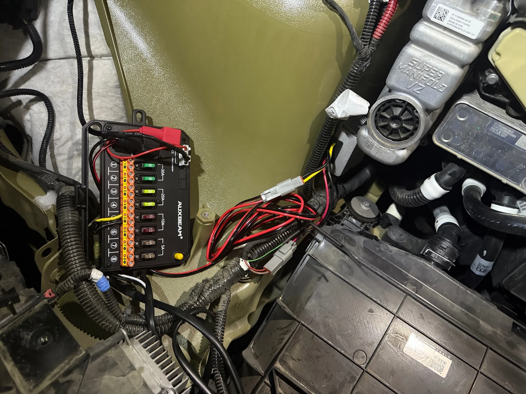 Tesla Cybertruck Split the 48v power line to a 12v socket in frunk. It now powers the console fridge INSIDE cabin 😎 IMG_9208