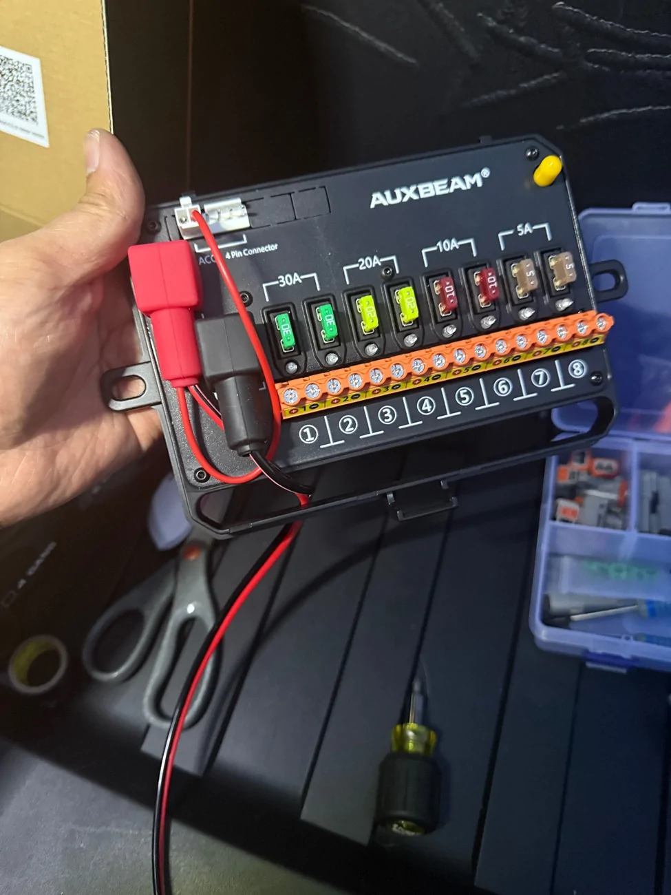 Tesla Cybertruck Split the 48v power line to a 12v socket in frunk. It now powers the console fridge INSIDE cabin 😎 IMG_9207