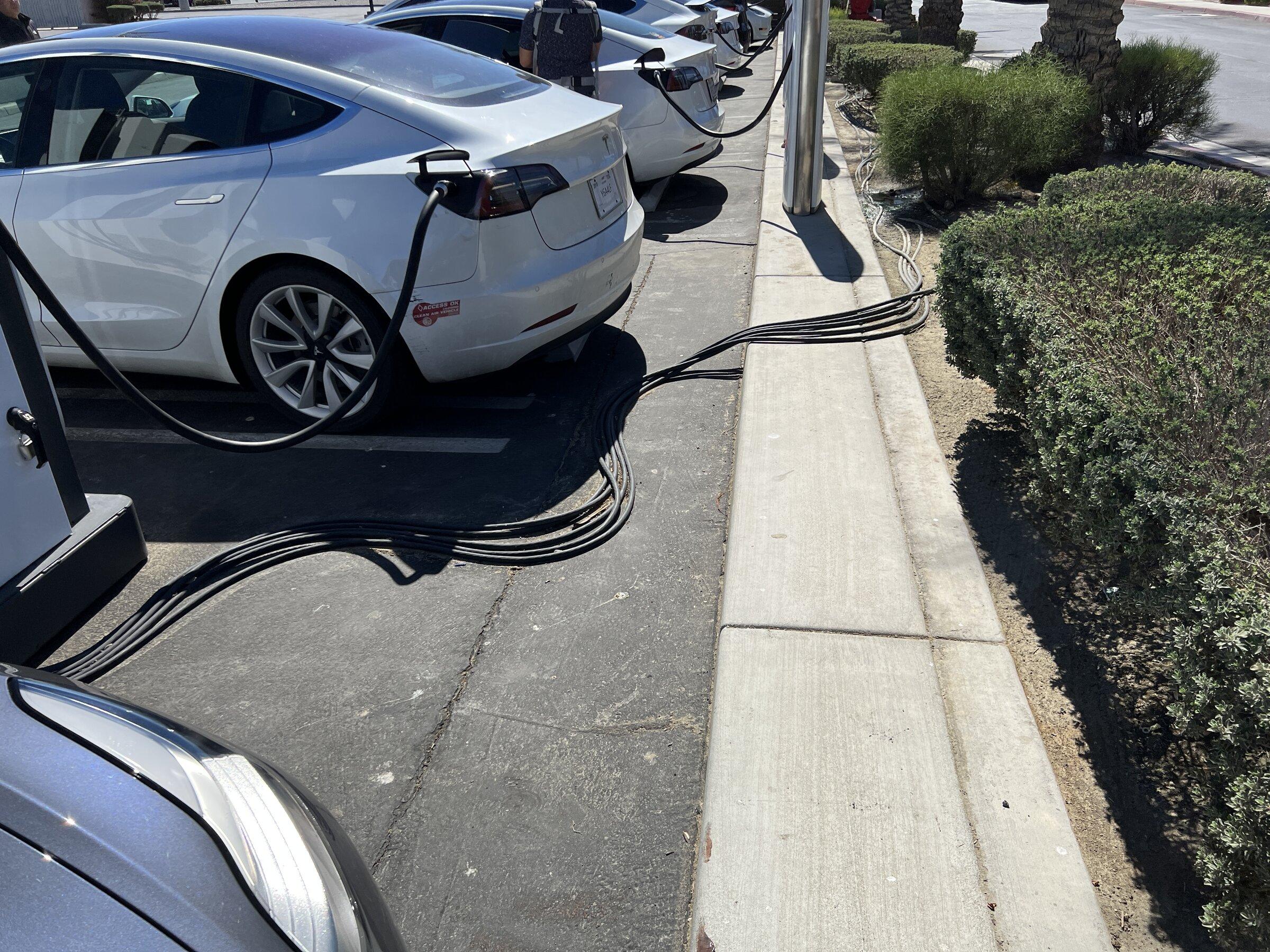 Tesla Cybertruck Pull-through Supercharger, and leaving home without a safety net (charge cord) 1646177259572