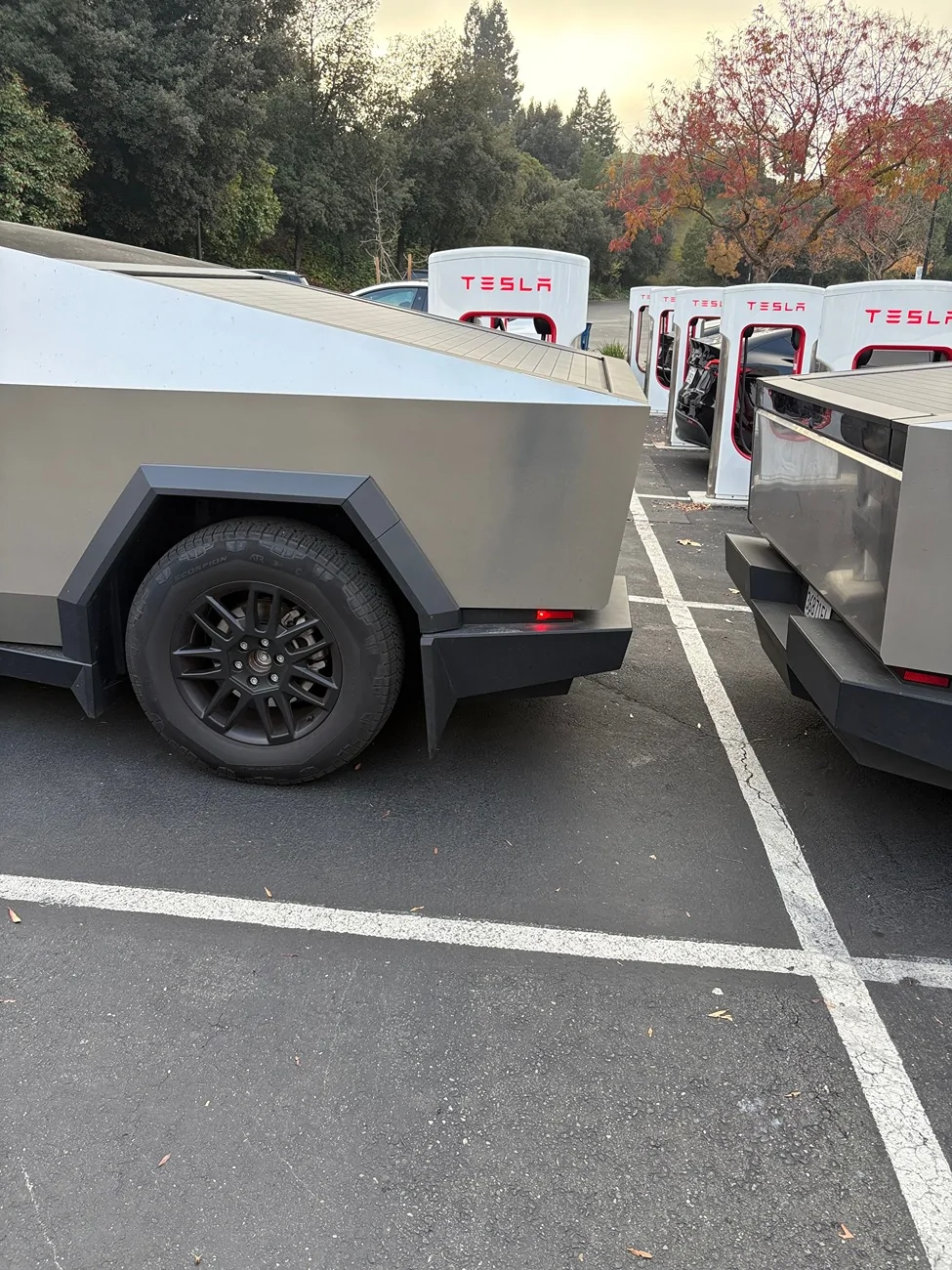 Tesla Cybertruck Supercharger FSD 14.2 issue with parking spot selected by FSD FSD14.2SuperChg