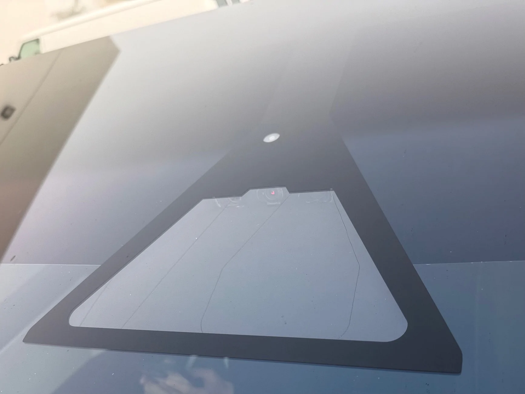 Tesla Cybertruck Cleaning front windshield camera IMG_1506
